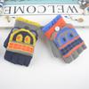 New autumn and winter children's flip gloves, cute cartoon half-finger leaking gloves, warm writing gloves wholesale
