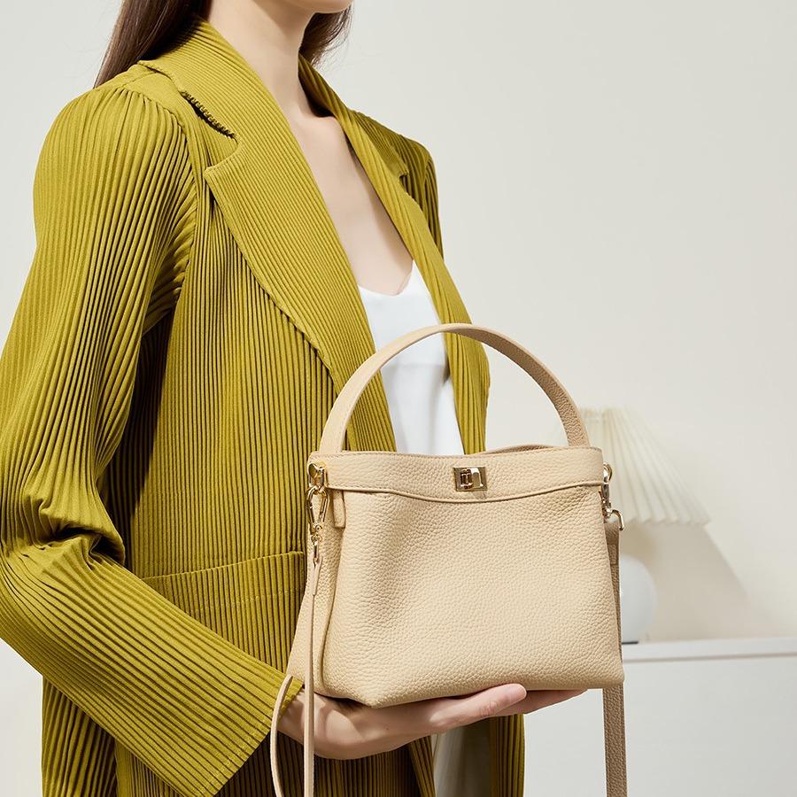 Commuter Leather Handbag New Versatile Niche Design Bucket Bag Shoulder Messenger Women's Bag