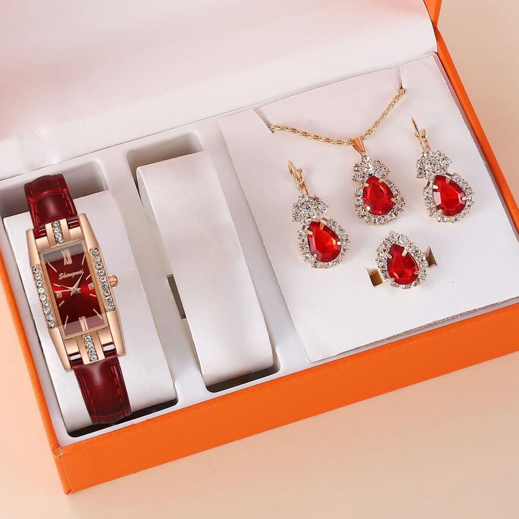 Vintage Schmuckset mit grünen Edelsteinen: Uhr, Halskette, Ohrringe und Ring