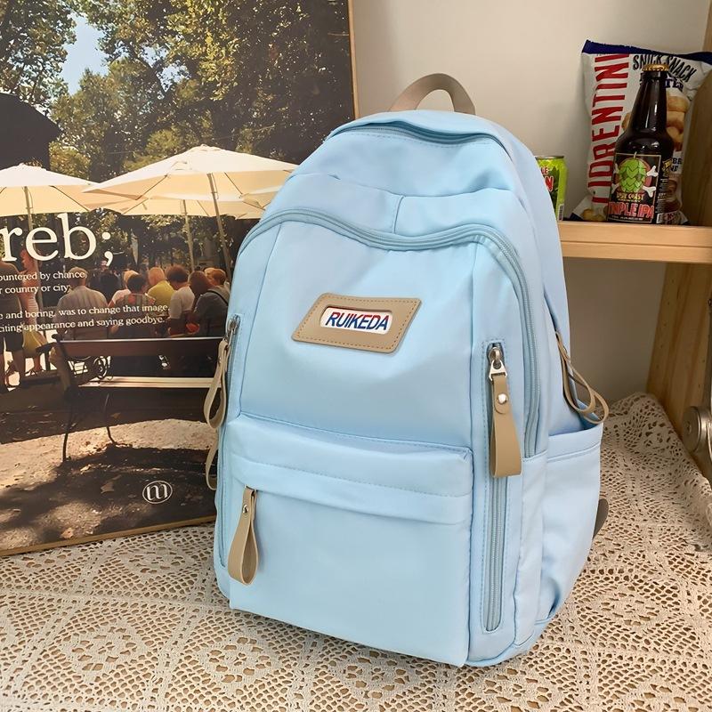 

Новый школьный рюкзак для студентов, одинаковый для мужчин и женщин, повседневный рюкзак с вставками, рюкзак для кампуса большой вместимости, модный синий