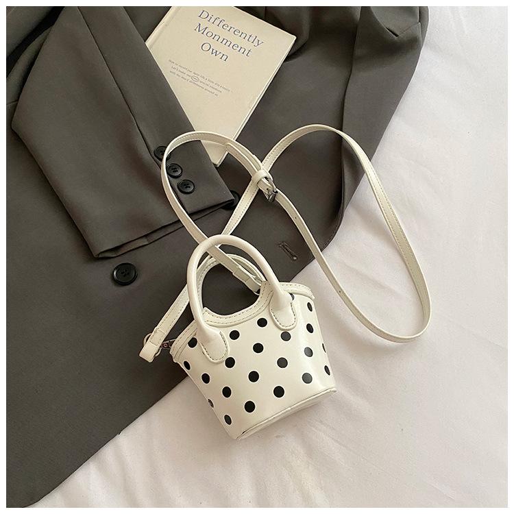 

2025 trendy small bag polka dot hand carry shoulder messenger bag children s bag mini portable vegetable basket bag summer