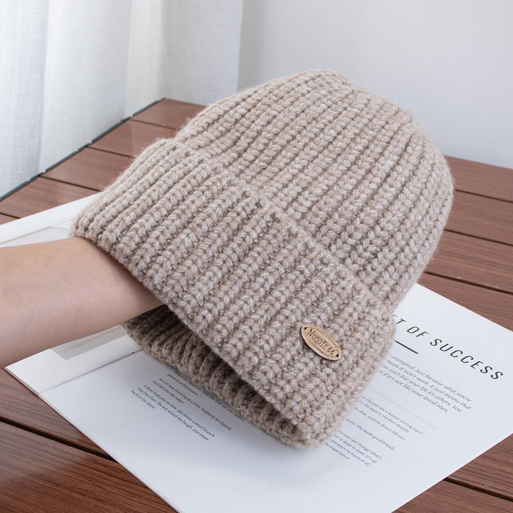 Exquisite small standard simple solid color autumn and winter warm wool knitted hat versatile daily warm face small knitted hat