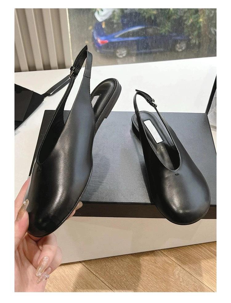 

High version niche new burst pattern cow pattern big head sandals women s rear strap comfortable flat bottom fashion bag head shoes 35 чорний