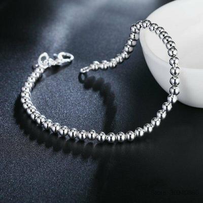 Classico bracciale da donna placcato in argento e oro con perle di Buddha da 4 mm: elegante e semplice.