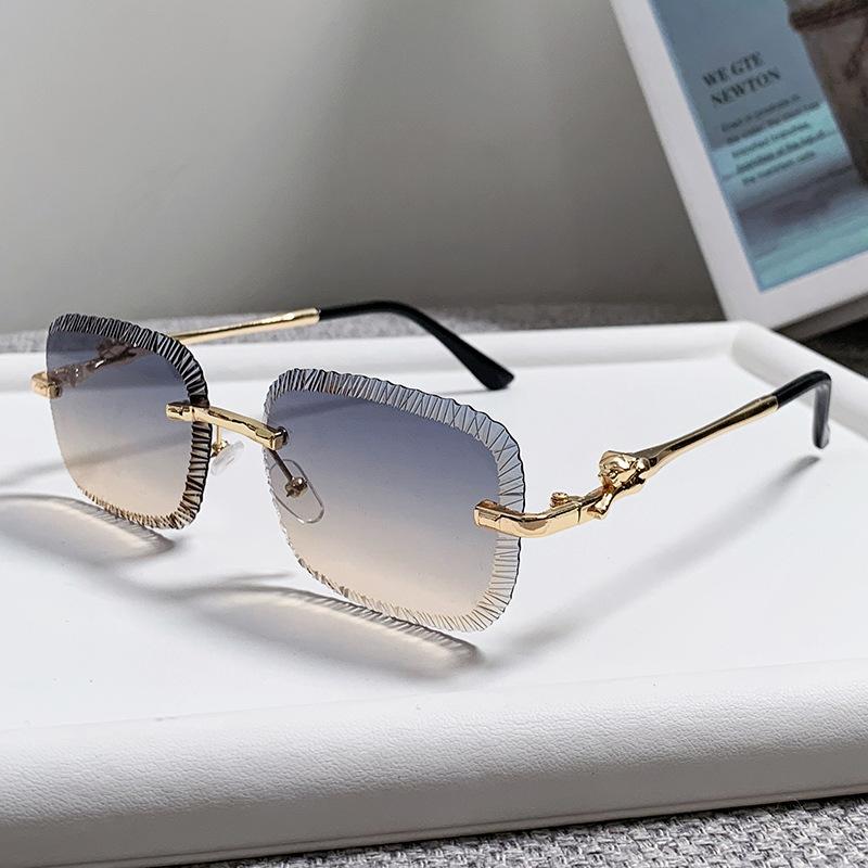 European and American fashion new card home serrated frameless sunglasses European and American ins fashion leopard head metal sunglasses