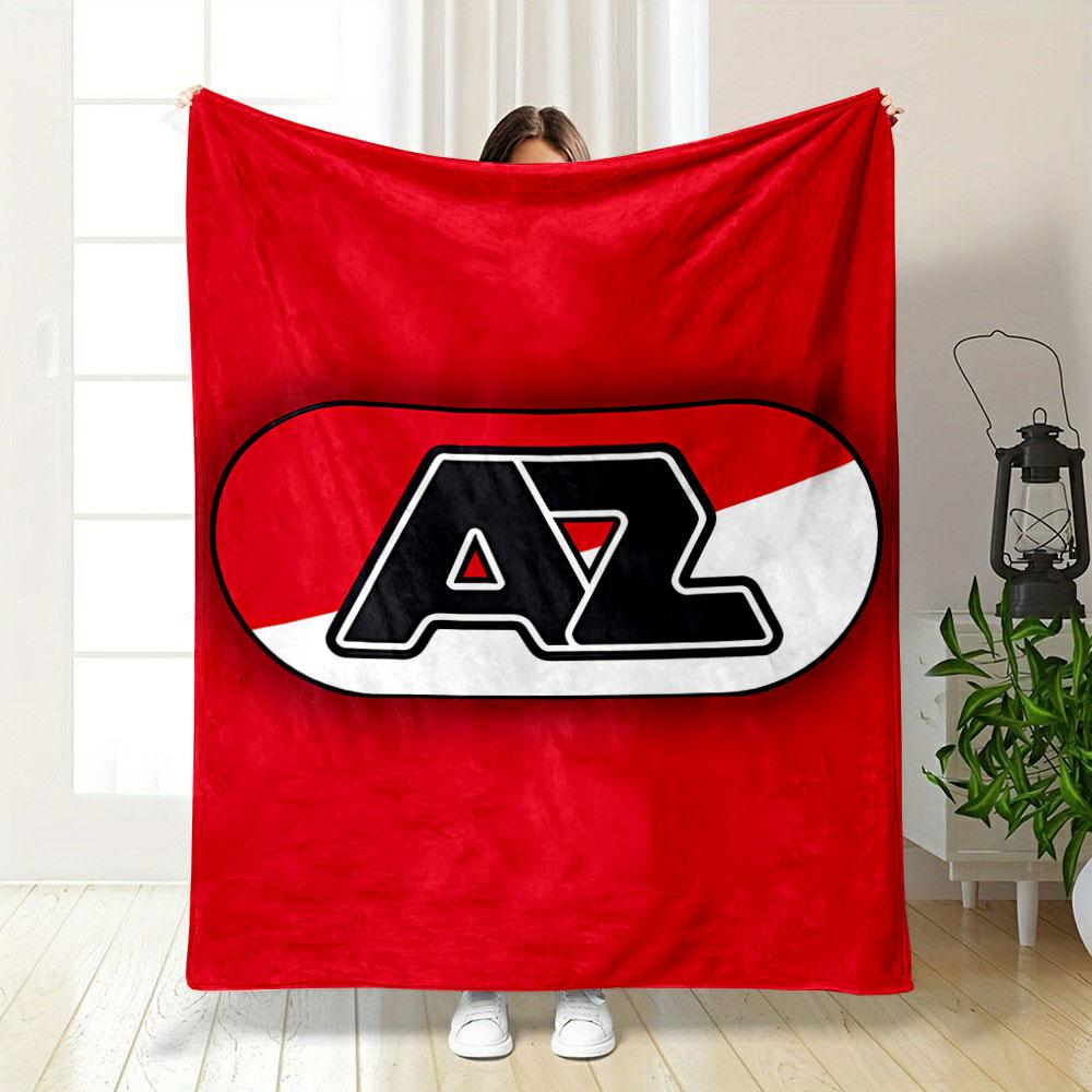 A bold "AZ" logo in black, over a red and white diagonal background. for all seasons blanket lunch break throw gift