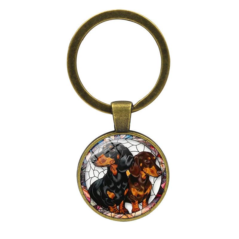 

Stylish Black And Brown Spotted Dog Keychain Pendant One Size