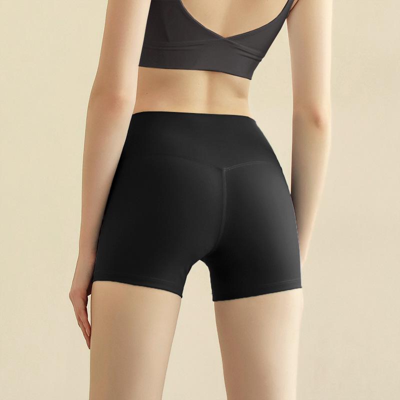 

Sports shorts spring and summer new solid color yoga shorts tight high waist elastic sports fitness three-point yoga pants women S чорний