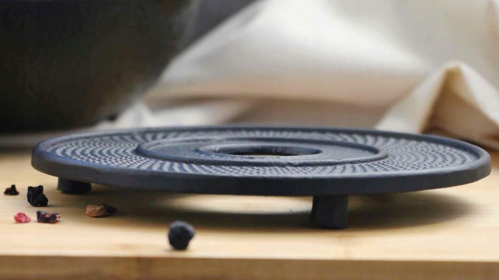 Cast Iron Protective Stand For A Hot Kettle Pot