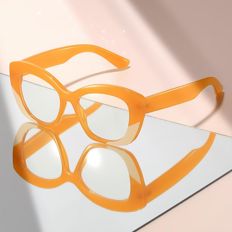 

The New Artistic Style Anti-Blue Light Glasses Feature Cat-Eye Color-Blocking Accents Giving A Sense Of High-End Flat Light