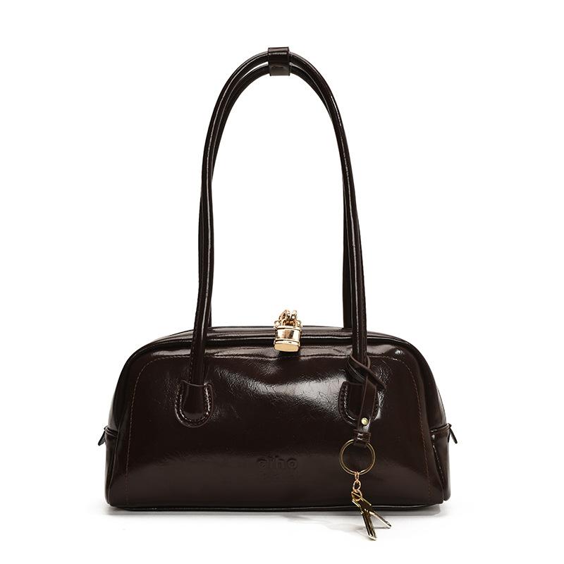 Simple retro bag women's new fashion niche shoulder armpit bag high-end commuter baguette bag