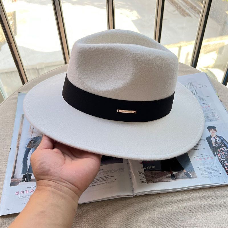 Export quality European, American French British autumn and winter flat edge woolen top hat men's and women's fashion wide-brimmed camel black versati