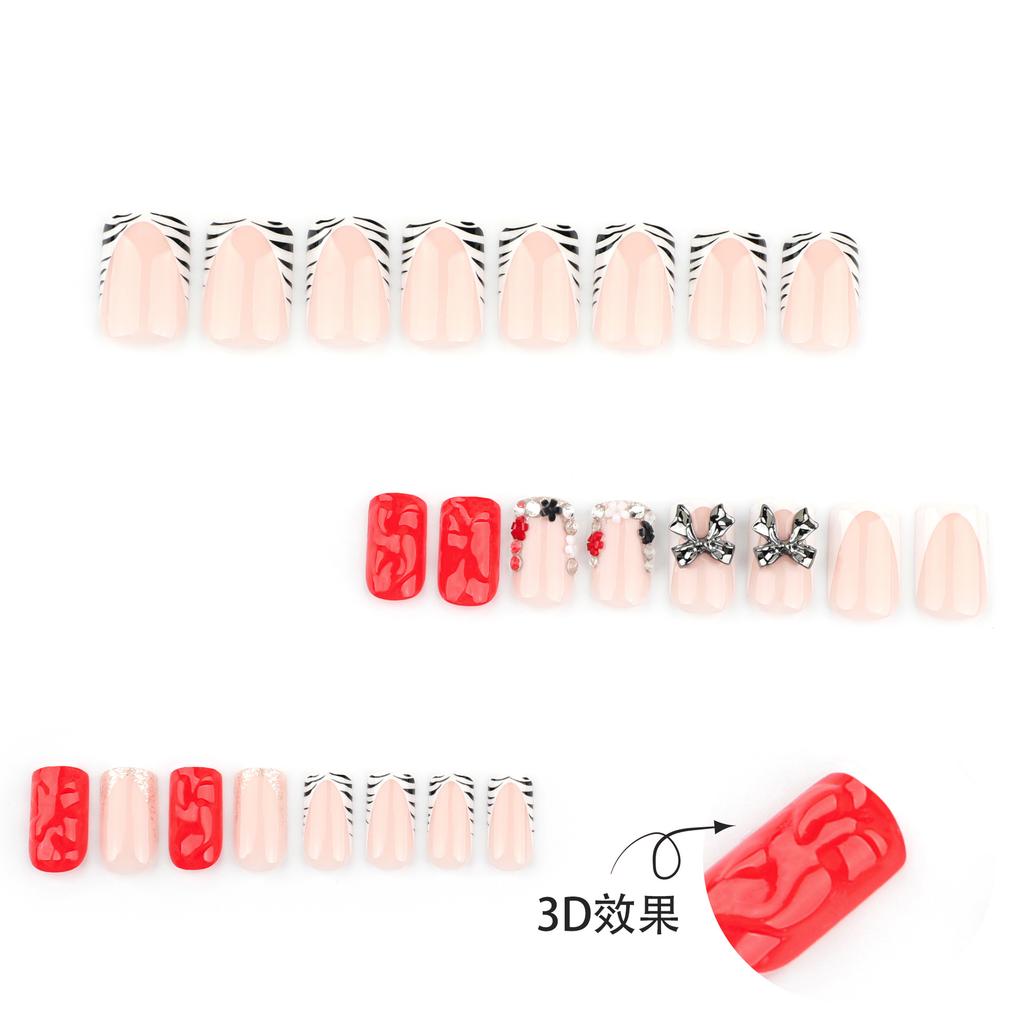 French black and white zebra pattern nail art piece point diamond metal bow wearing nail 3D red square wearing nail piece