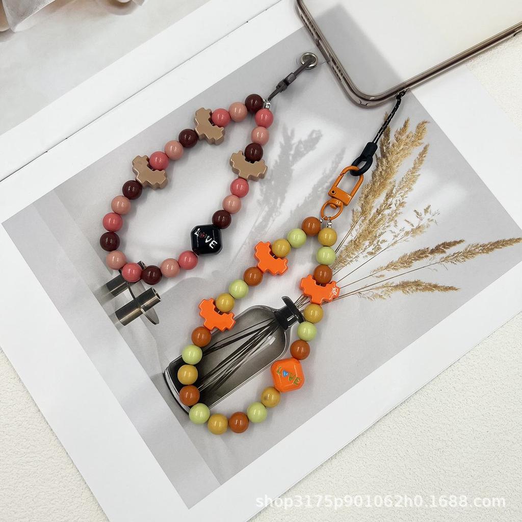 Acrylic Cute Cartoon Mobile Phone Lanyard with Dual Accessories for Versatile Use As Keychain and Bag Accessory.