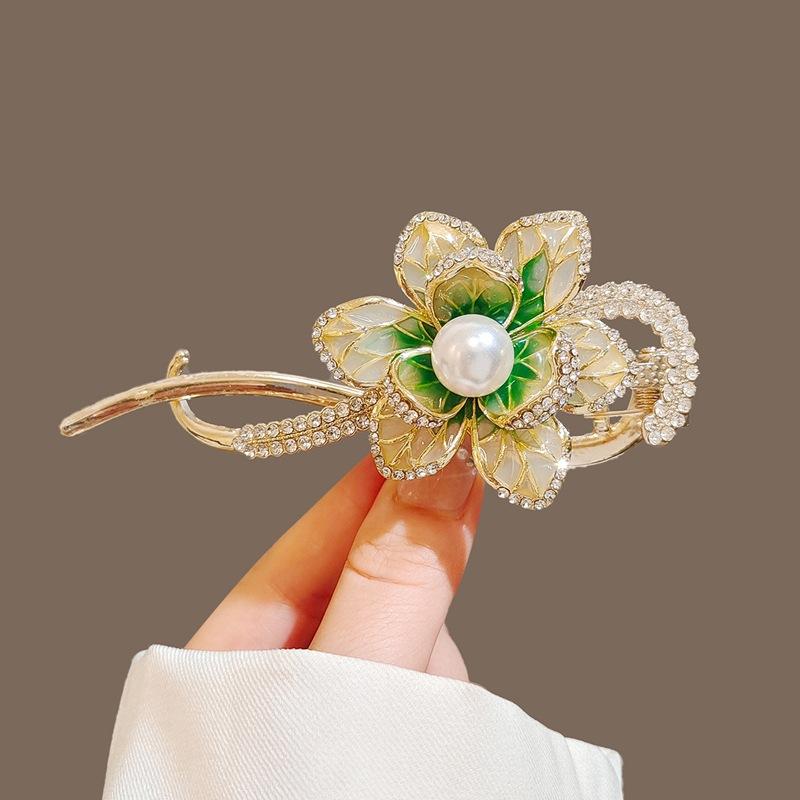 Factory direct fashion flower pearl twist clip elegant hairpin Internet celebrity head spring clip
