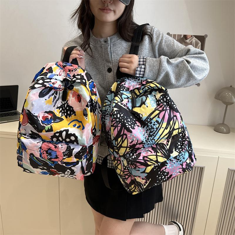 School bag female Mori junior high school girl backpack high school college student graffiti color matching lightweight backpack