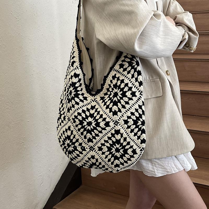 

Hollow ins vacation shoulder bag retro straw bag women s 2025 summer new Mori braided shoulder tote bag