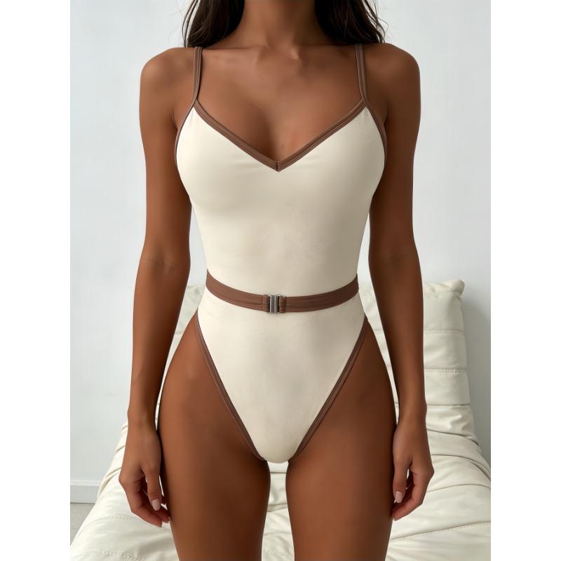 Costume da bagno intero da donna bianco e nero con bordino, scollo a V e cintura