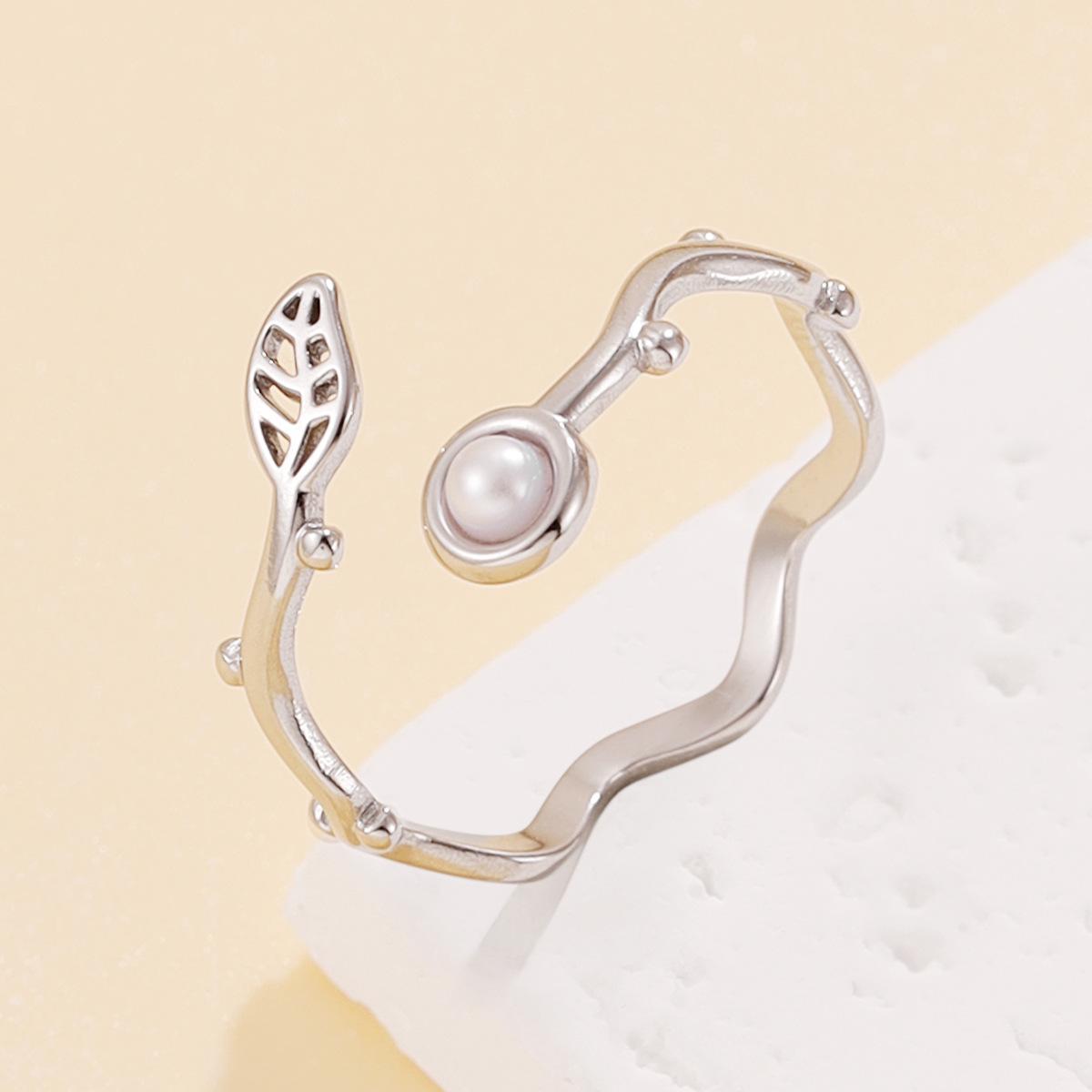 Elegant Pearl Ring with Hollow Leaf Design - Stainless Steel Jewelry for Fresh Campus Style