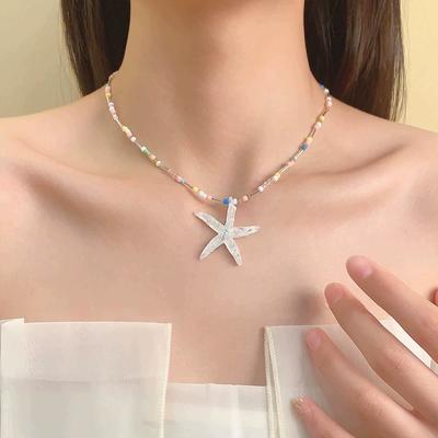 Trend Seestern Anhänger Halskette Glänzende Harzperlen Choker Schlüsselbeinkette Süße Halskette für Frauen Mädchen Sommerurlaub Schmuck
