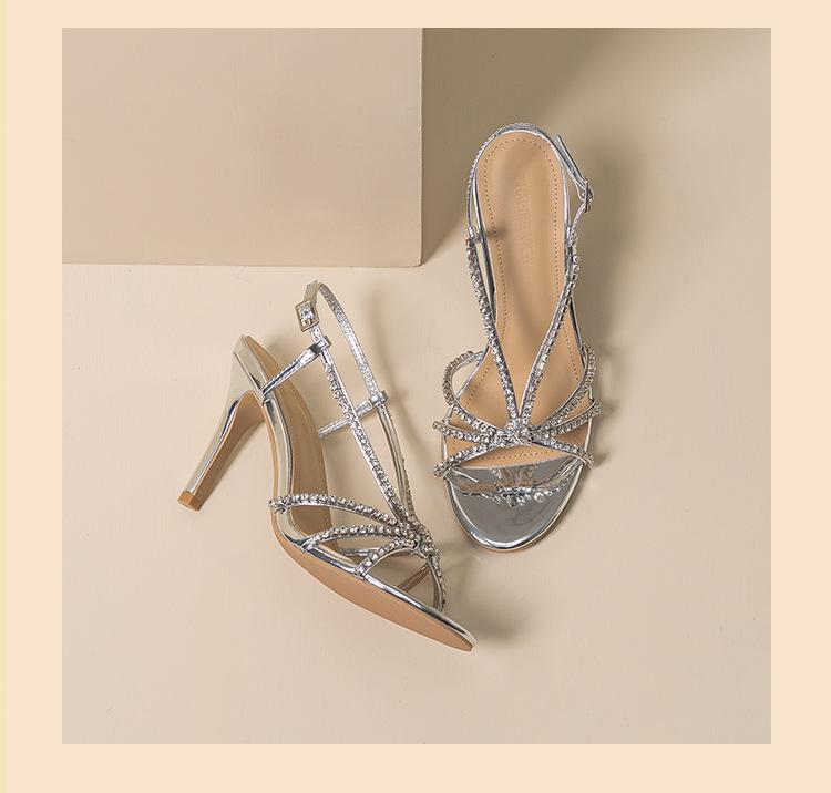 

Женские сандалии новая весна и осень высокие каблуки шпилька с открытым носком банкетный светский темперамент стразы серебристые красивые сандалии 40