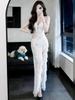 Women's French Retro Lace Spaghetti Strap Evening Gown with Patchwork, Hollow Design, and Beach Split