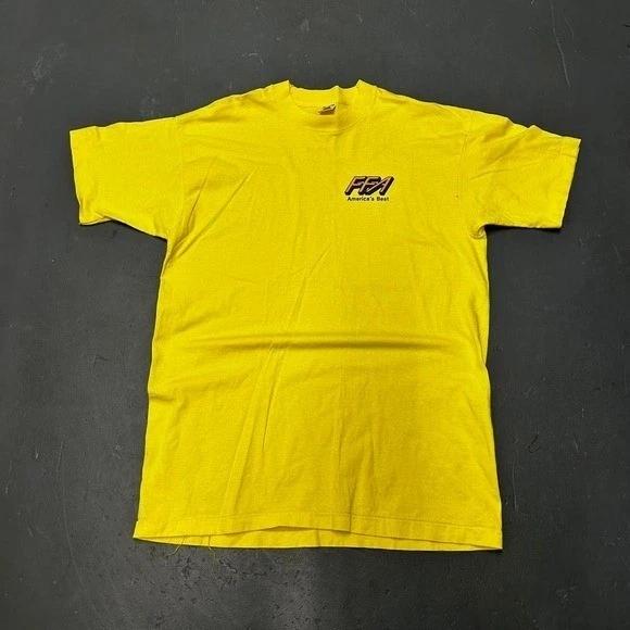 

Vintage 90s single stitch essential yellow FFA graphic tee shirt tshirt XL