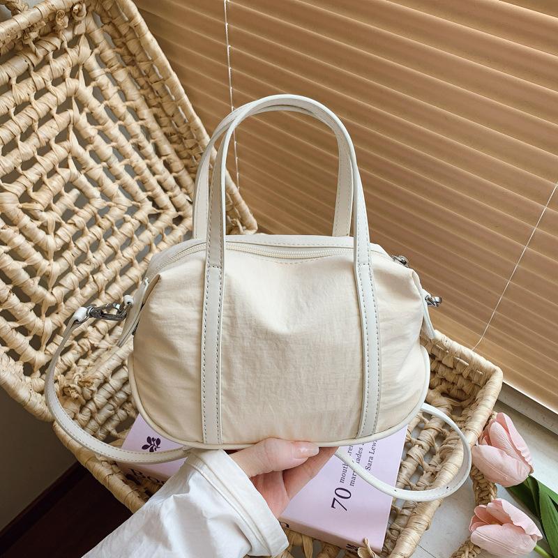 

Korean version of fashion canvas bag design sense niche handbag 2025 new simple nylon cloth small square bag messenger bag