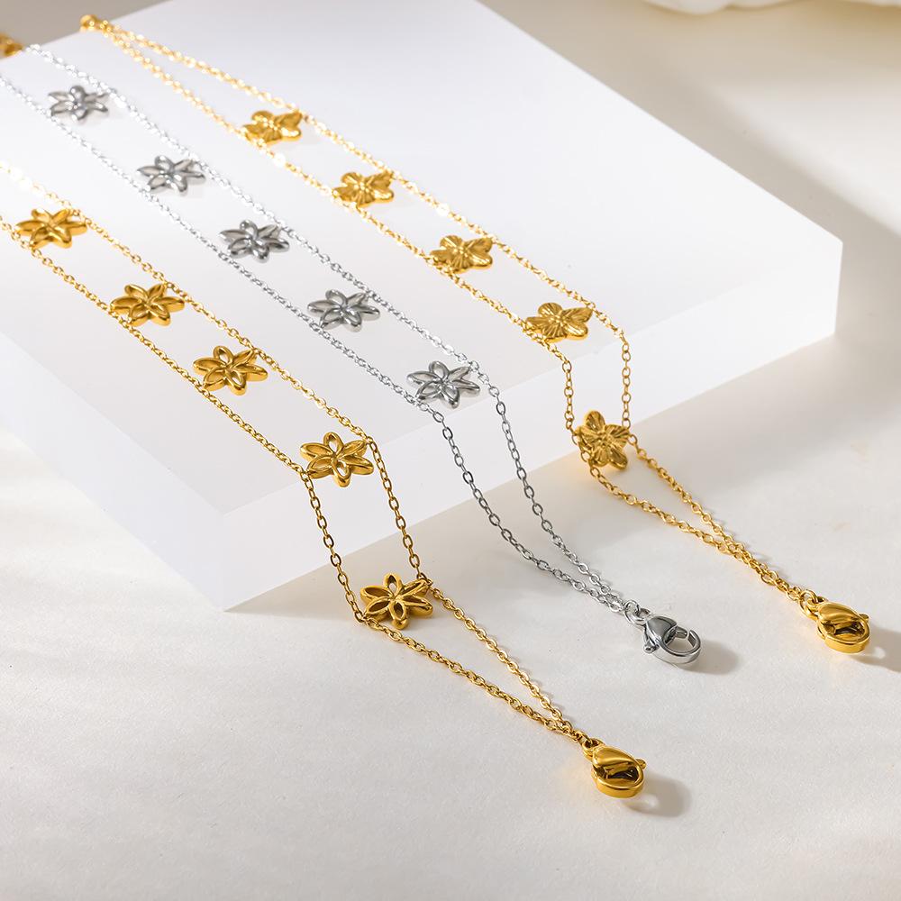 ins-plated 18k gold embossed hollow flower double-layer stacked bracelet stainless steel waterproof jewelry light luxury premium