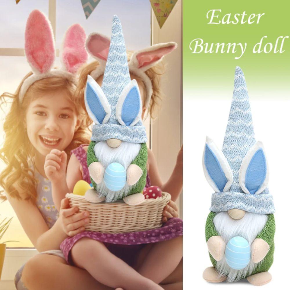 Ei haltende gesichtslose Strickpuppe Mehrfarbiges Design Ostergnom Puppe Zwerg Puppe Festliche Dekoration