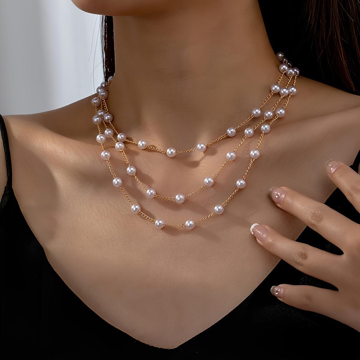 

Fashionable three-layer necklace золотой