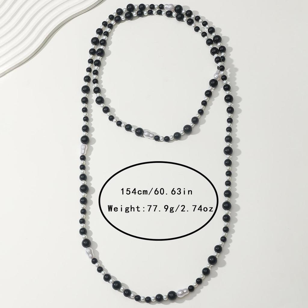 Elegant Retro Pearl Necklace: Women's High-End Light Luxury Sweater Chain.