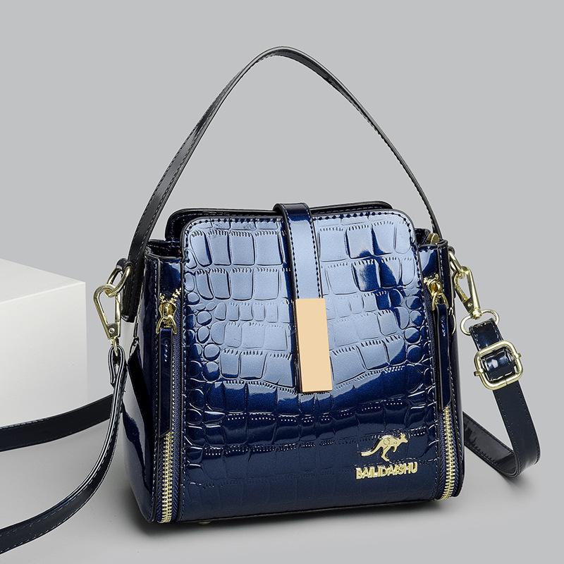 Eine trendige und stilvolle Umhängetasche und eine tragbare Mama-Tasche