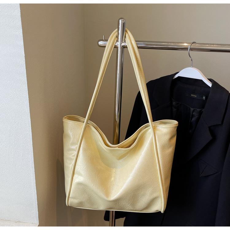 

Сумка большой вместимости женская летняя универсальная 2025 новая высококлассная на плечо текстурная популярная классная сумка-тоут для поездок на работу жёлтый