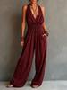 Damen Neckholder Jumpsuit mit weitem Bein Unifarben Tasche Lässiger lockerer Schnitt Rückenfrei Strampler