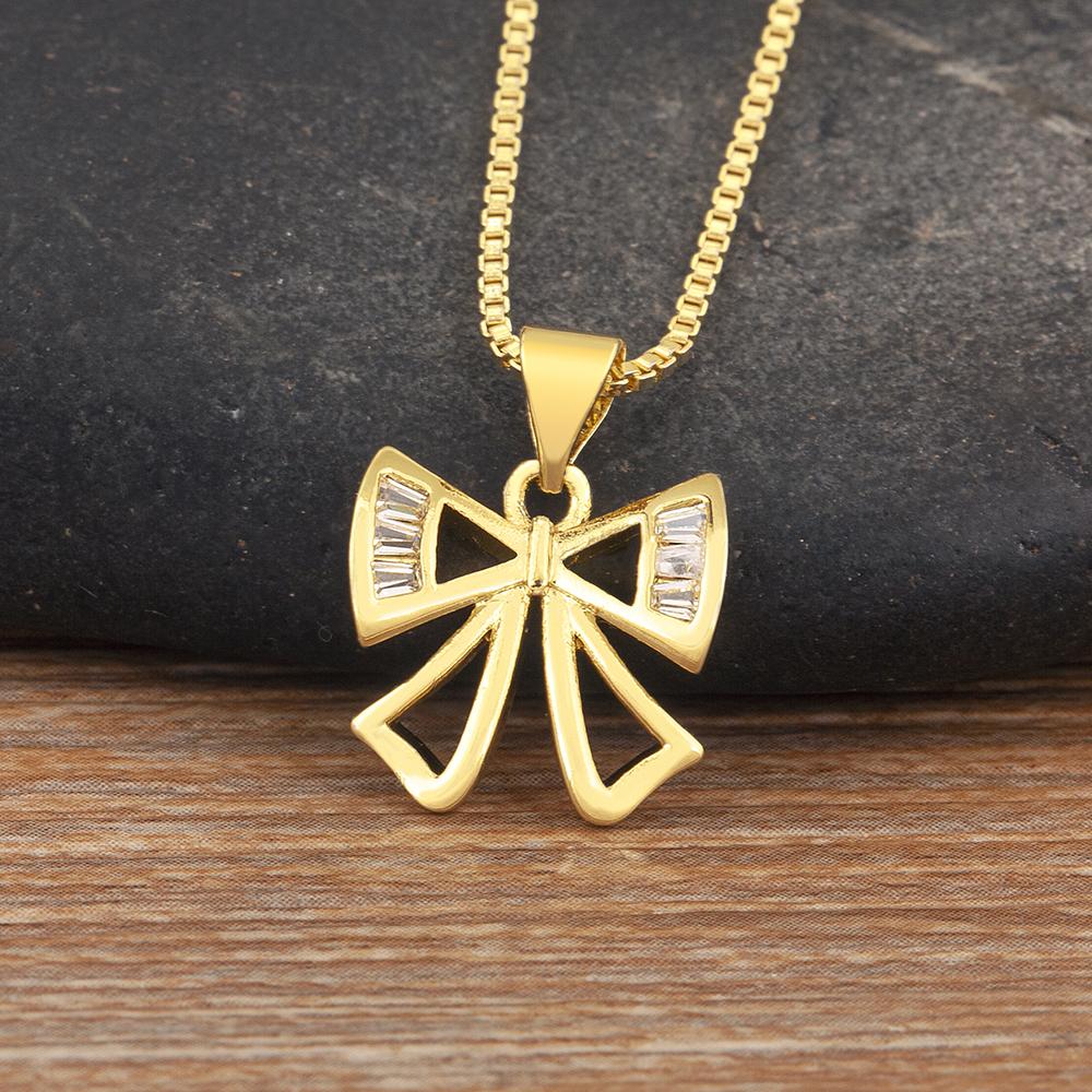 

Nidin New Trendy Hollow Design Bow Knot Shape Charm Ribbon Pendant Necklace S/L Sizes Choice Copper Inlaid Zircon Jewelry Gifts