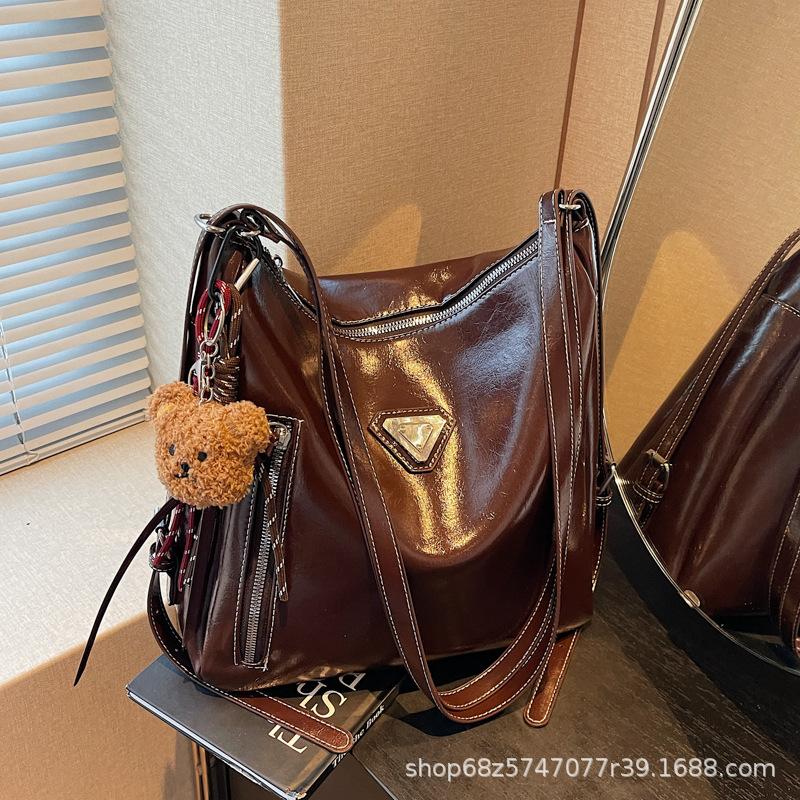 

This year s popular manufacturer s big bag women s 2025 new trendy temperament tote bag large capacity crossbody bag темно-коричневого кольору