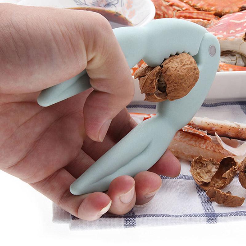 

Товары для домашней вечеринки Горячая распродажа Креативный крекер для грецкого ореха Многофункциональные профессиональные кухонные принадлежности Крабовые клещи Твердый зажим для орехов Shucker 1 шт. розовый