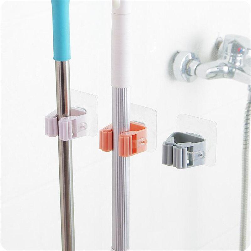 Versatile Wall Mounted Mop Organizer Holder With Durable Non-slip Design For Efficient Storage
