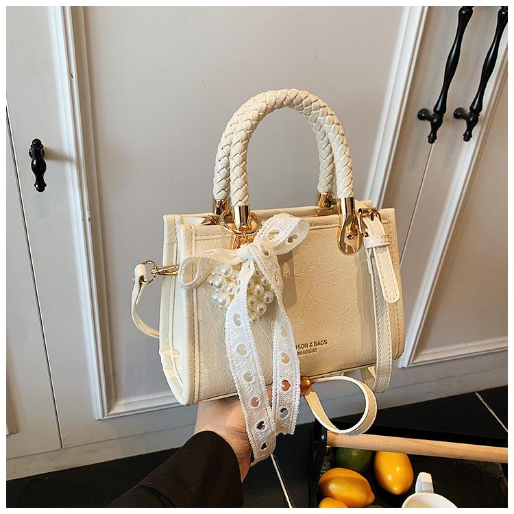 

Small bag women s summer versatile 2025 new fashion simple messenger bag portable small square bag