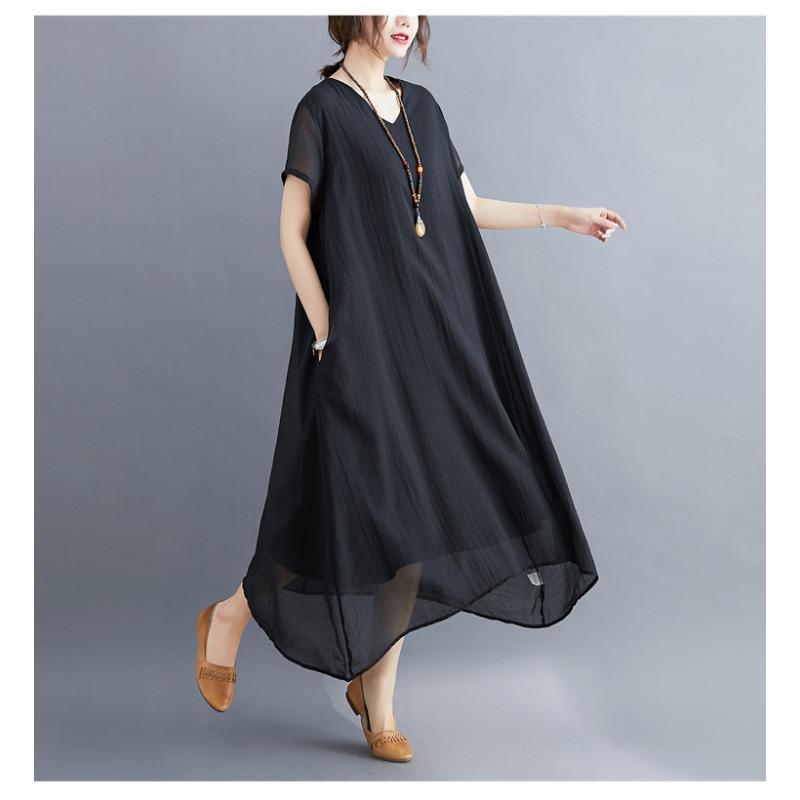 A Woman In A Solid V-neck Dress for Summer