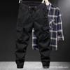 Casual overalls men's spring and autumn loose tied feet multi-pocket solid color overalls men