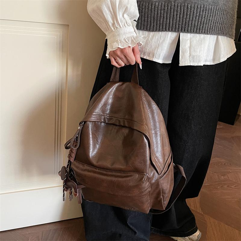 Fashionable PU Leather Backpack with Adjustable Shoulder Straps Simple Design Suitable for Daily Use Travel Shopping and Other Scenarios No Pendant