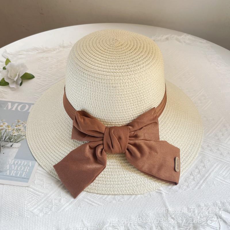 Hepburn style straw hat seaside vacation sun hat summer straw braided big brim temperament bow sun hat women's