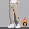 Fleece tied feet casual pants men's autumn and winter thickened men's casual sports pants Korean version loose nine-point pants