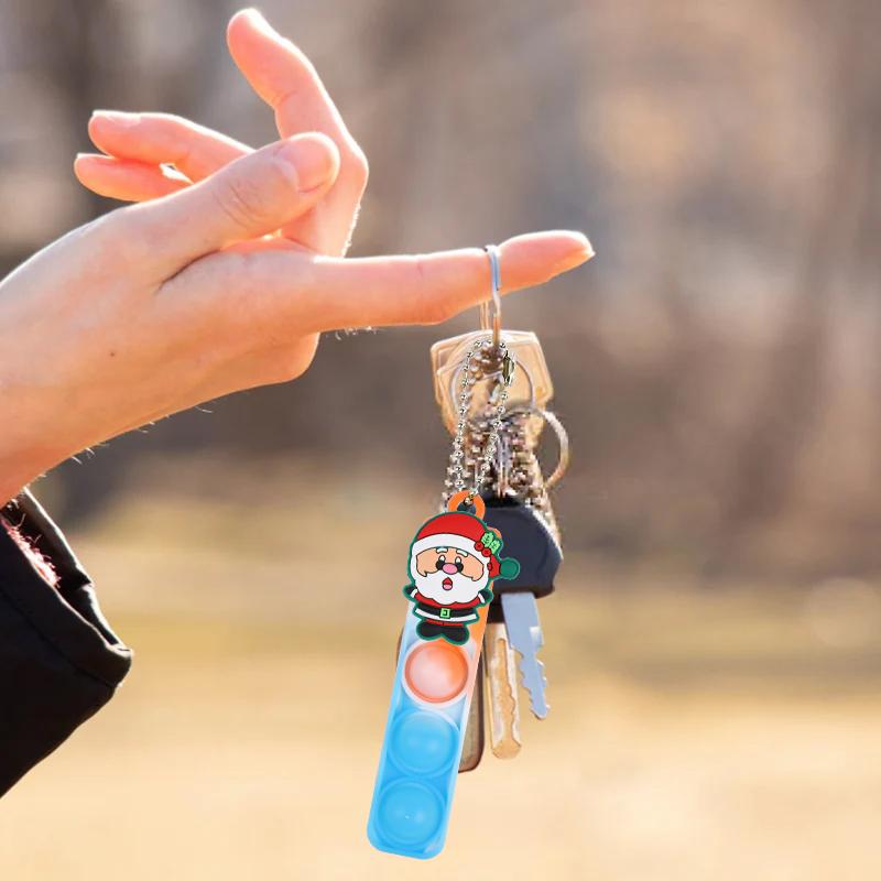 10-30Pcs Cartoon Christmas Pop Keychains Fidget Stress Relief Toys Santa Claus Snowman Kids Christmas Party Favors New Year Gift