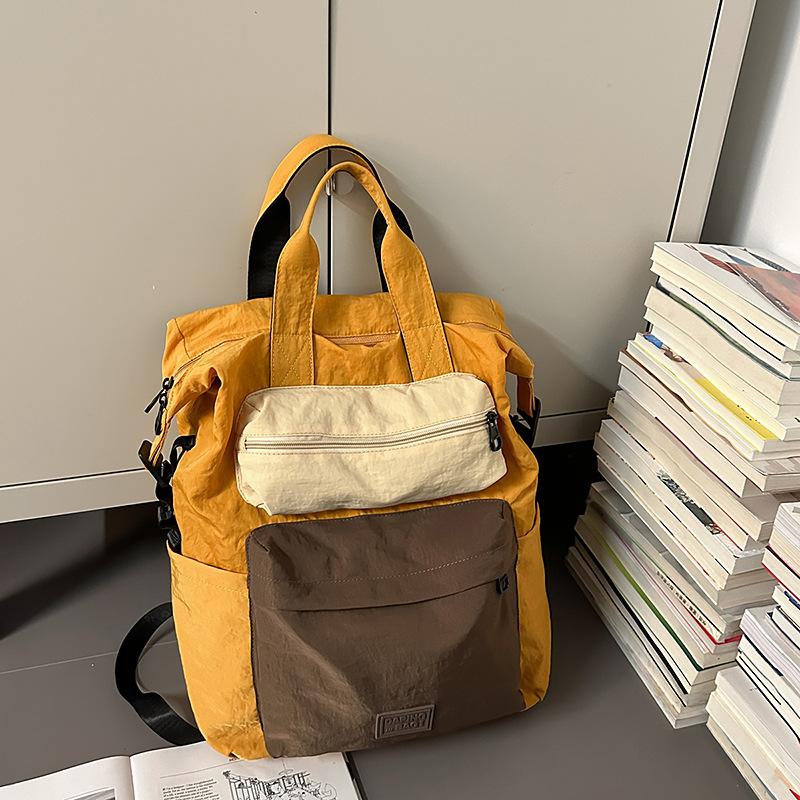 Portable backpack simple contrasting color middle school student backpack velvet square label schoolbag