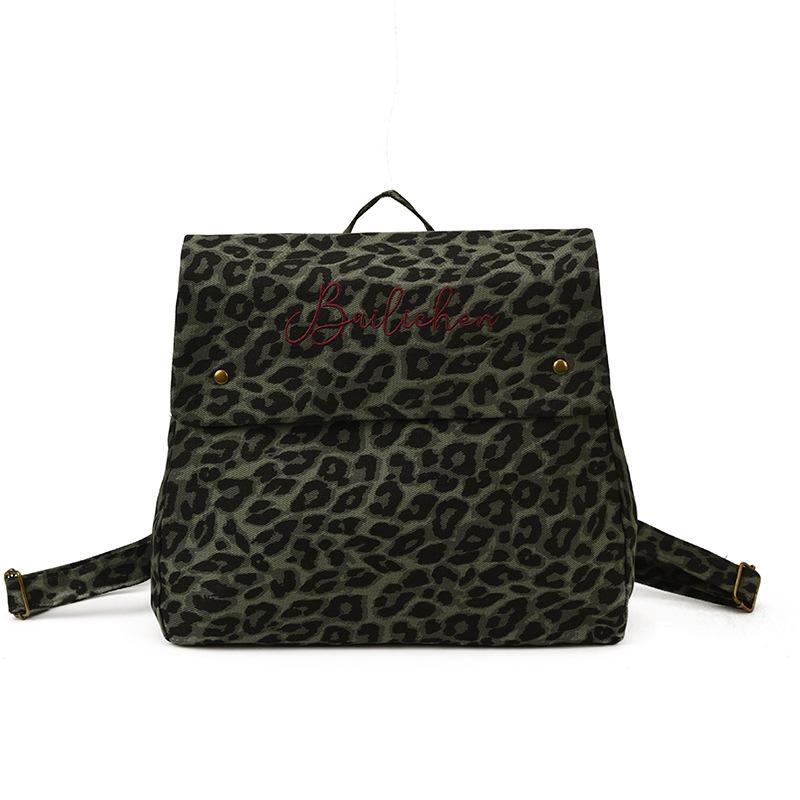 Leopard print backpack women's fashion niche design sense student class bag canvas retro tote bag travel backpack