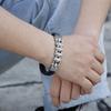European-American Punk Bicycle Chain Titanium Steel Bracelet with Woven Cowhide In Stainless Steel Motorcycle Design.