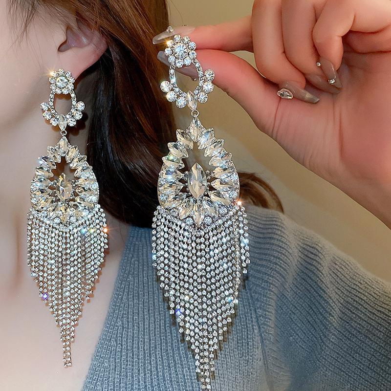 Silver Zirconia Bow Tassel Earrings: Korean Style, Exaggerated Luxury Ear Stud Ornaments.